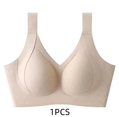 A beige wireless bra with a seamless, molded cup design and ribbed texture, shown against a plain white background with '1PCS' text below.