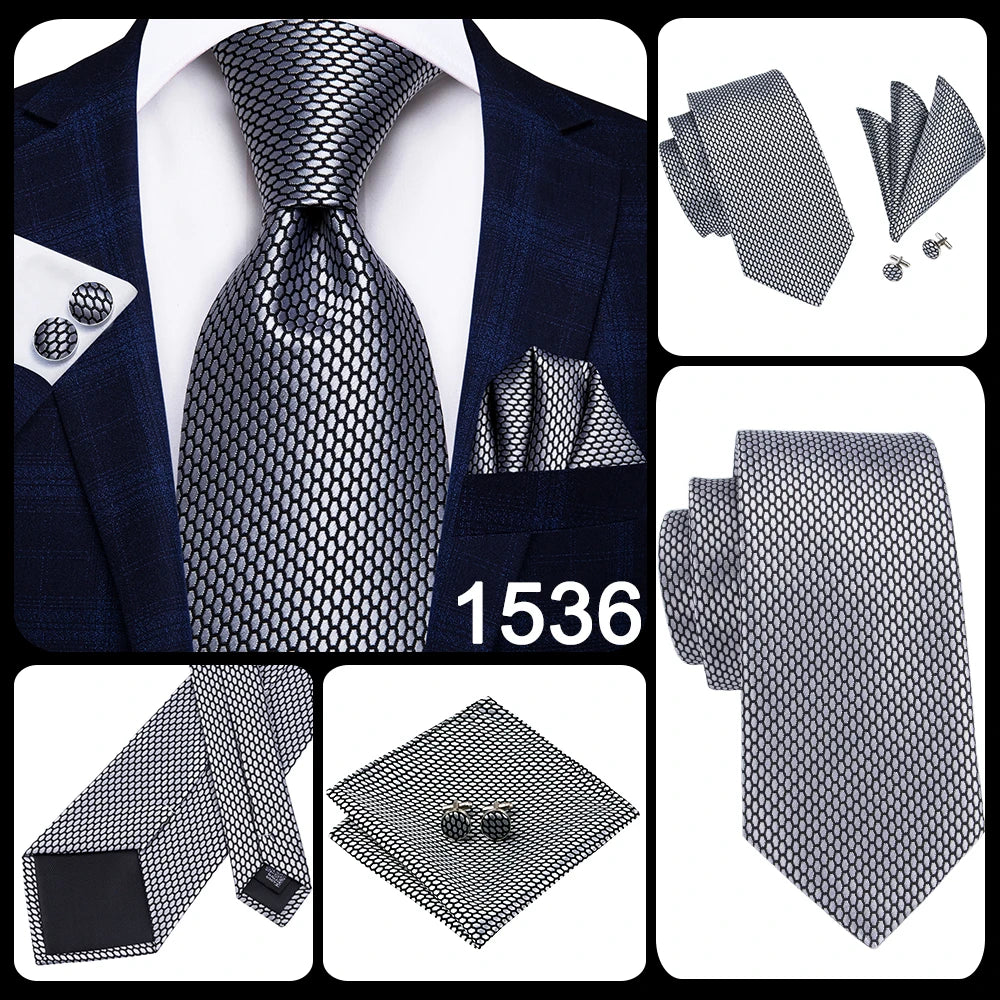 Black and silver patterned tie set with matching pocket square and cufflinks on a white background. Men’s luxury paisley silk tie and pocket square set, 8.5cm wide, for business or wedding. Red formal necktie, ftf fashion UK.