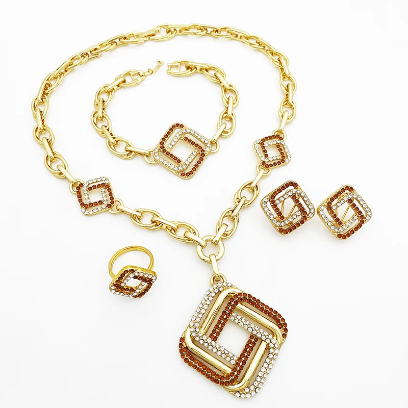 Dubai 18K gold plated 4-piece jewelry set flat lay showing necklace, bracelet, earrings and ring with crystal square pendants