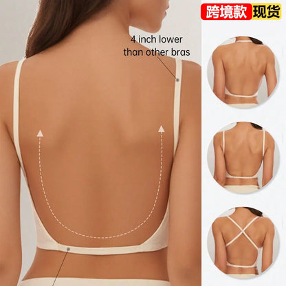 Woman wearing a beige bra with text indicating it's 4 inches lower than other bras, on a plain background.