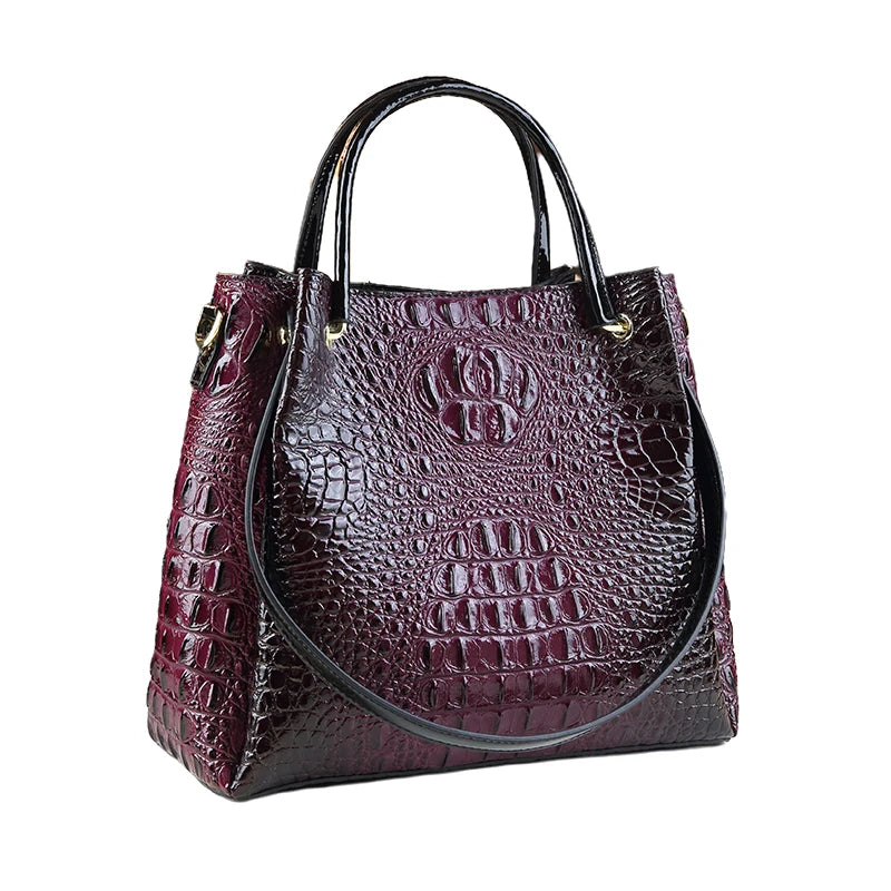 Purple crocodile-patterned handbag on a white background. Vintage genuine leather bucket tote bag with crocodile print. Soft medium-hardness leather, zipper closure, interior pockets. Stylish crossbody bag UK.