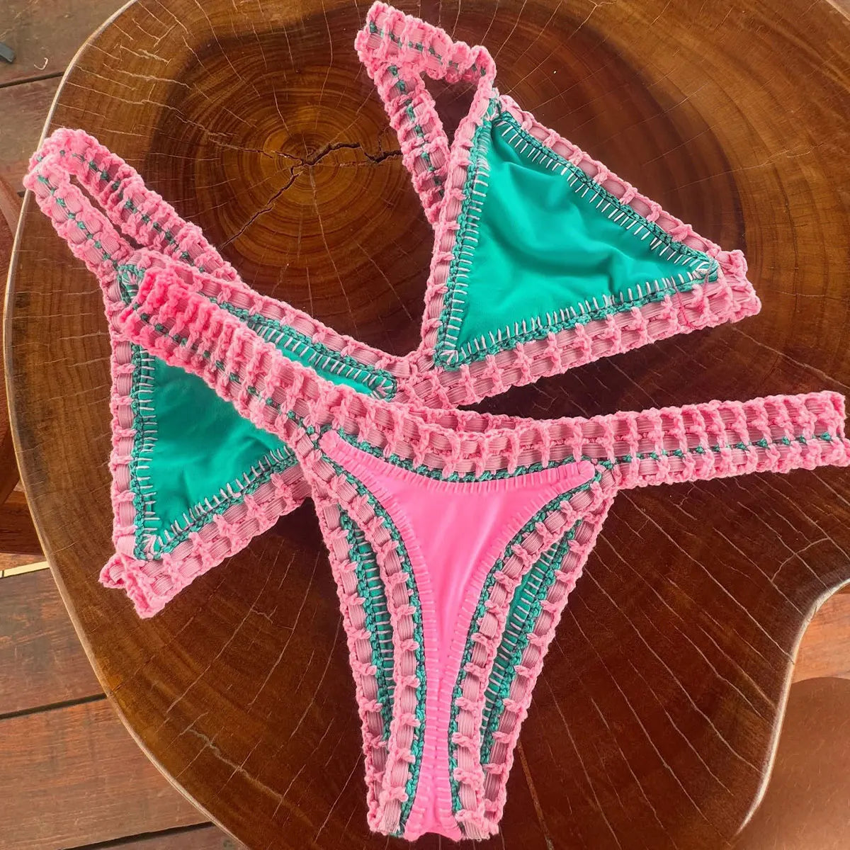 Pink and mint triangle bikini sets flat lay — women push up swimwear