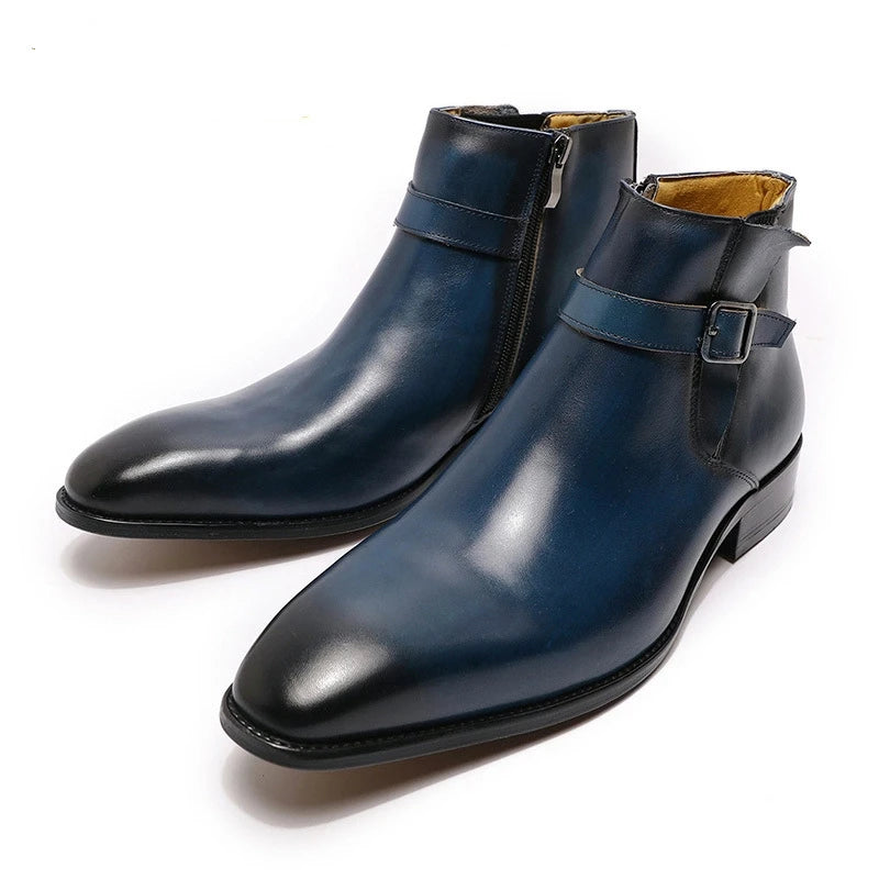 Pair of blue leather boots with buckles on a white background