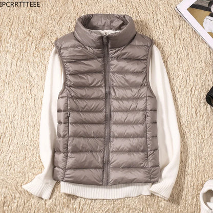 2023 New Women Sleeveless Slim Ultra Light Down Jacket, portable, lightweight vest, windproof, warm waistcoat, women's gift, ftf fashion, Ultra Light Down Jacket, sleeveless women's jacket, slim fit jacket, portable lightweight vest, windproof warm waistcoat, women's fashion, autumn winter wear, lightweight women's vest, cozy winter jacket, fashionable winter vest, women's outerwear, ftf fashion