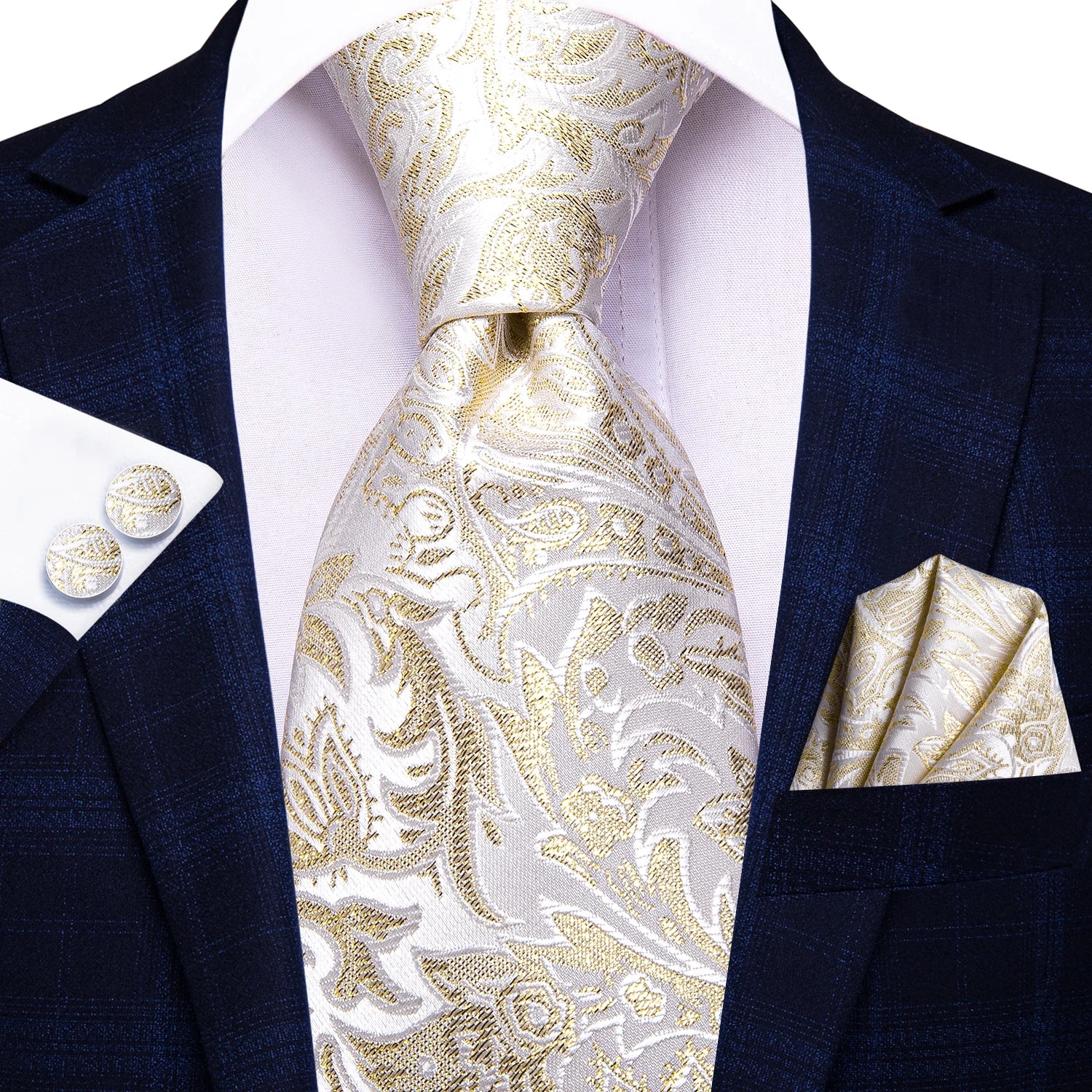 Navy suit with gold paisley tie, pocket square, and cufflinks on a white background. Men’s luxury paisley silk tie and pocket square set, 8.5cm wide, for business or wedding. Red formal necktie, ftf fashion UK.