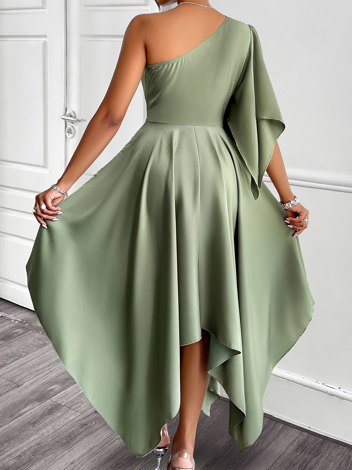 Elegant asymmetrical one-shoulder peplum dress, solid color, high-low midi, ruffle sleeve.