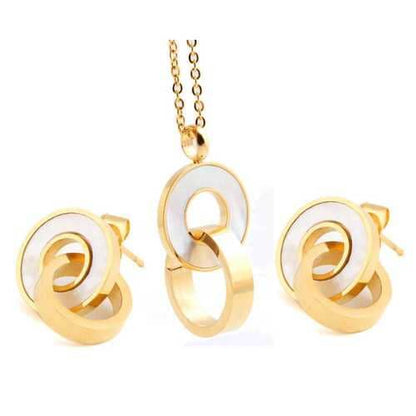 Gold and white circular earrings on a white background