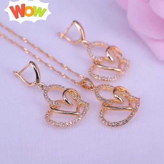 Elegant Heart In Heart Gold Jewelry Set - Pendant, Necklace, Earrings, and Bracelet