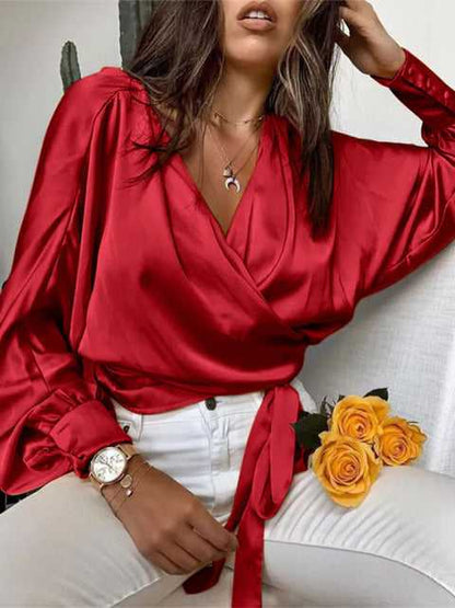 Stylish woman wearing FTF Market's oversized blouse in Wine Red, showcasing its versatile and comfortable design